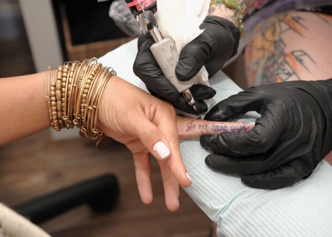 women tattoo on finger tattoos