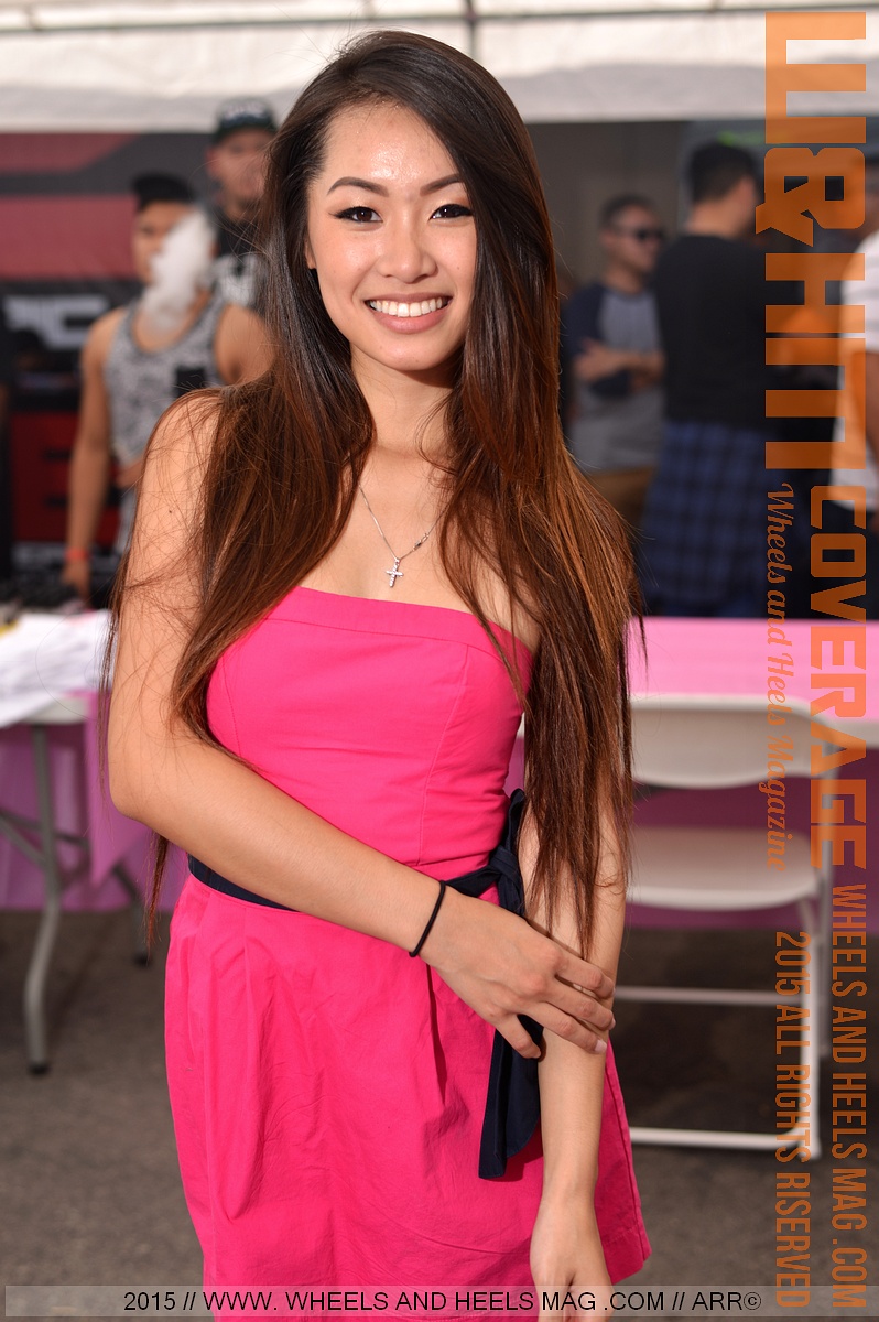 Wheels and Heels Magazine Cover Model Elizabeth Tran is  the most active model at the show, having a great time with everybody