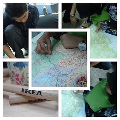 Munkit & Intan perusing the Melaka map, Too bad Munkit can't make it :(