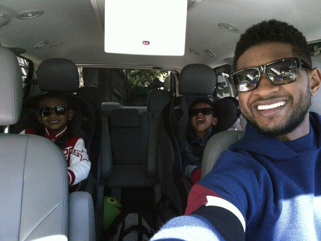 Usher Raymond IV takes the wheel while his sons Usher Raymond V and Naviyd