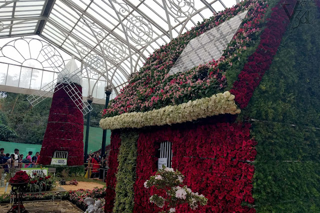 floral decorations of green energy house and wind mill