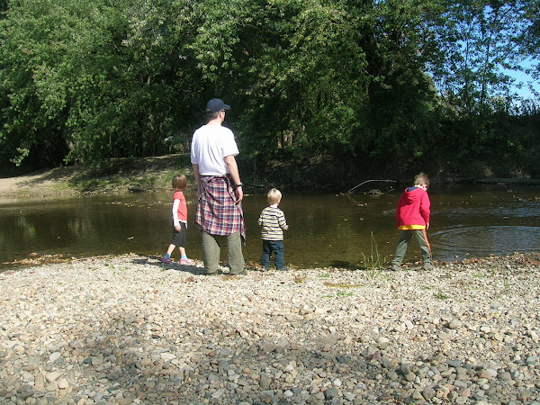 Throwing rocks into the creek!!!