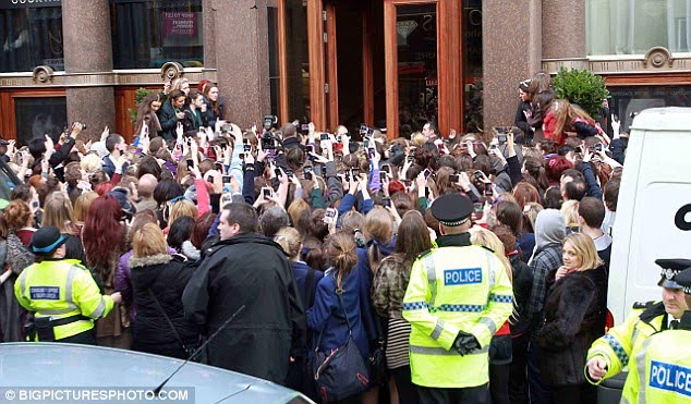 justin bieber one less lonely girl liverpool. Biebermania! Teen idol Justin Bieber trapped inside his Liverpool hotel as fans bring city to a standstill