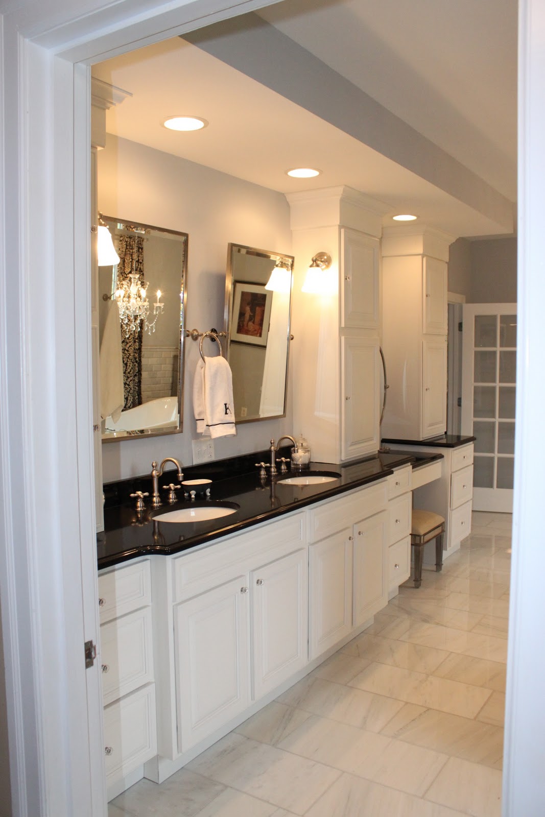 bathroom rain shower And finallymy dream bathroom. It has storage, white marble, a 