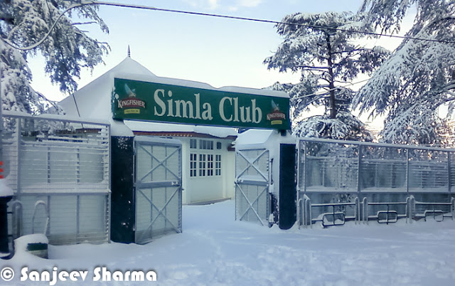 Shimla is enjoying the fresh snowfall on the hills and people have come out to celebrate in white Shimla. Let's check out these mobile clicks from Shimla by Mr Sanjeev Sharma (Senior Reporter, Zee).Here is a photograph of Shimla covered with snow layer and all white. Photograph has been clicked from one end of the mall road near Oberoi Hotel. Ridge Church looks amazing on top of the town and everything else covered with White layer of fresh snowfall.Shimla meteorological office director Manmohan Singh said, high hills of state would get heavy snowfall on Friday and moderate snowfall on Saturday. So many folks in Chandigarh & Delhi are supposed to come to Himachal to experience fresh snowfall during the weekend.A brilliantly clicked photograph of Sanjeev Sharma, which shows the view of Ridge ground in Shimla. There is a small place to overlook this whole ground and photograph is clicked from the same place. This elevated shed comes of the way from Ridge Ground to Jakhu Temple. A photograph of Shimla Club which is again situated on Mall Road. This is one of the great place to celebrate special occasions, although everyone is not allowed in Shimla Club.Hoteliers in Shimla & other places of Himachal Pradesh say snowfall would prove boon for tourism as visitors would throng Himachal to see the fresh snow. Many trourists visit Shimla during winters in a hope to see fresh snowfall happening. Traffic in these towns was partially affected in upper. There was minimal impact on main highways connecting Shimla & Manali to Chandigarh/Delhi.A view of Christ Church from mall road, just below it. This church is situated on the famous Ridge ground of Shimla.Ridge ground view after fresh snowfall in Shimla. Although there are some footsteps on the snow, which shows that many shimlites have already had a round on ridge ground to enjoy in first snowfall of 2013.Upper reaches of Himachal Pradesh received snowfall on Thursday much to the delight of tourists and residents, who had been experiencing sub-zero temperatures for the past one month. Since Thursday morning, Shimla and Manali received 5 to 8cm snow while Rohtang pass in Kullu district got over 60cm. It had last snowed in Shimla and Manali on December 14.