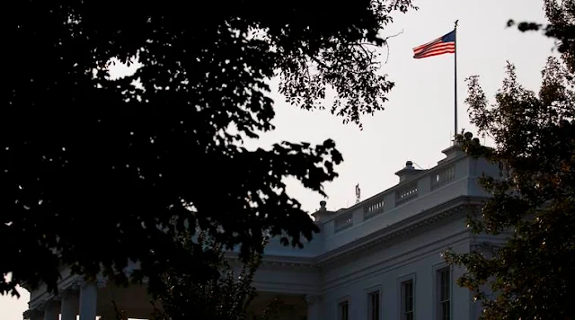 An American flag above the White House flies at full-staff less than 48 hours after the death of Sen. John McCain, Monday, Aug. 27, 2018, in Washington.