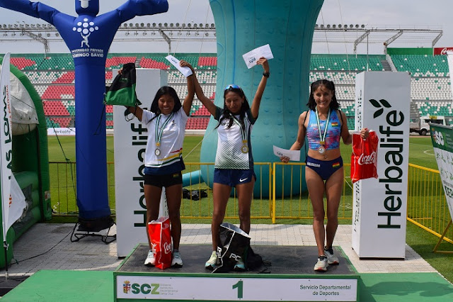 VICTOR HUGO AGUILAR Y JHOSELYN CAMARGO GANARON LA XXI CORRIDA INTERNACIONAL SANTA CRUZ