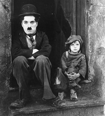 Chaplin and Jackie Coogan in the movie The Kid