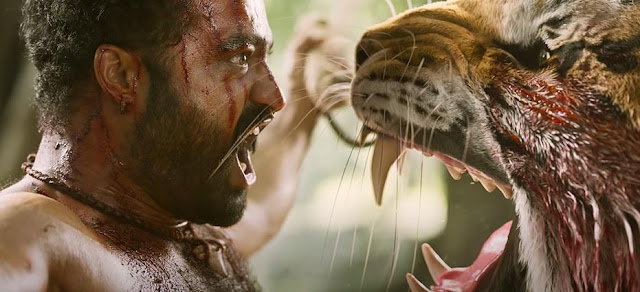 Young Tiger Jr NTR fighting with real tiger in RRR film by SS Ramouli