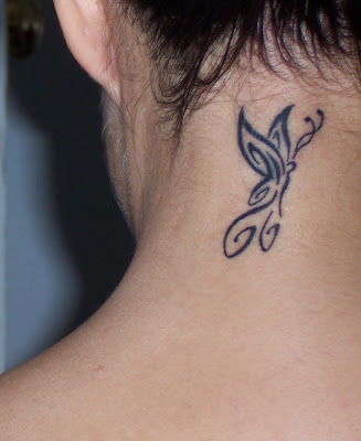 Neck butterfly tattoo