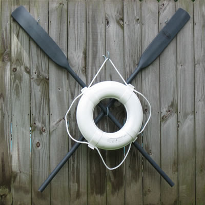 Crossed Oars with Life Buoy, close up