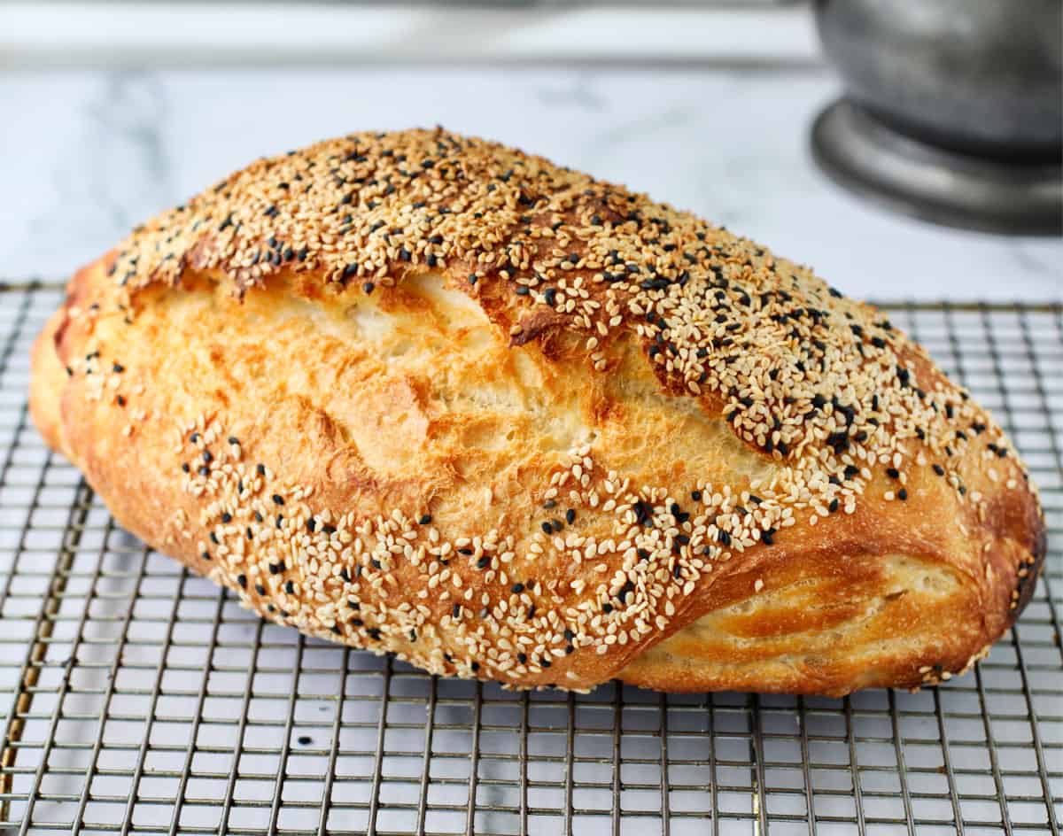 Durum Wheat Sesame Bread on a cooling rack.