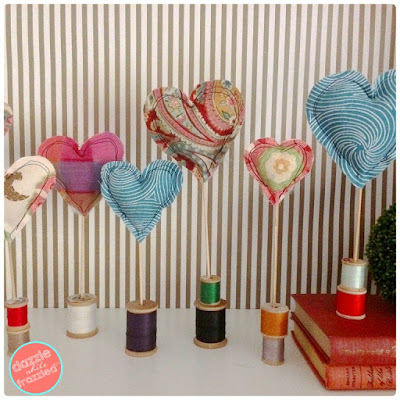 http://dazzlewhilefrazzled.com/diy-fabric-heart-decorations/