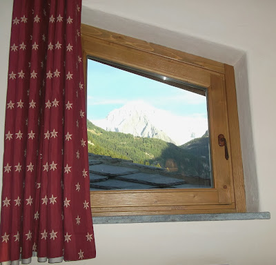 A splendid view of the Mont Blanc from a window at the Locanda Bellevue hotel