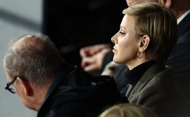 Princess Charlene wore a new Max Mara coat. She wore a gold earrings and a ring by Repossi Antifer