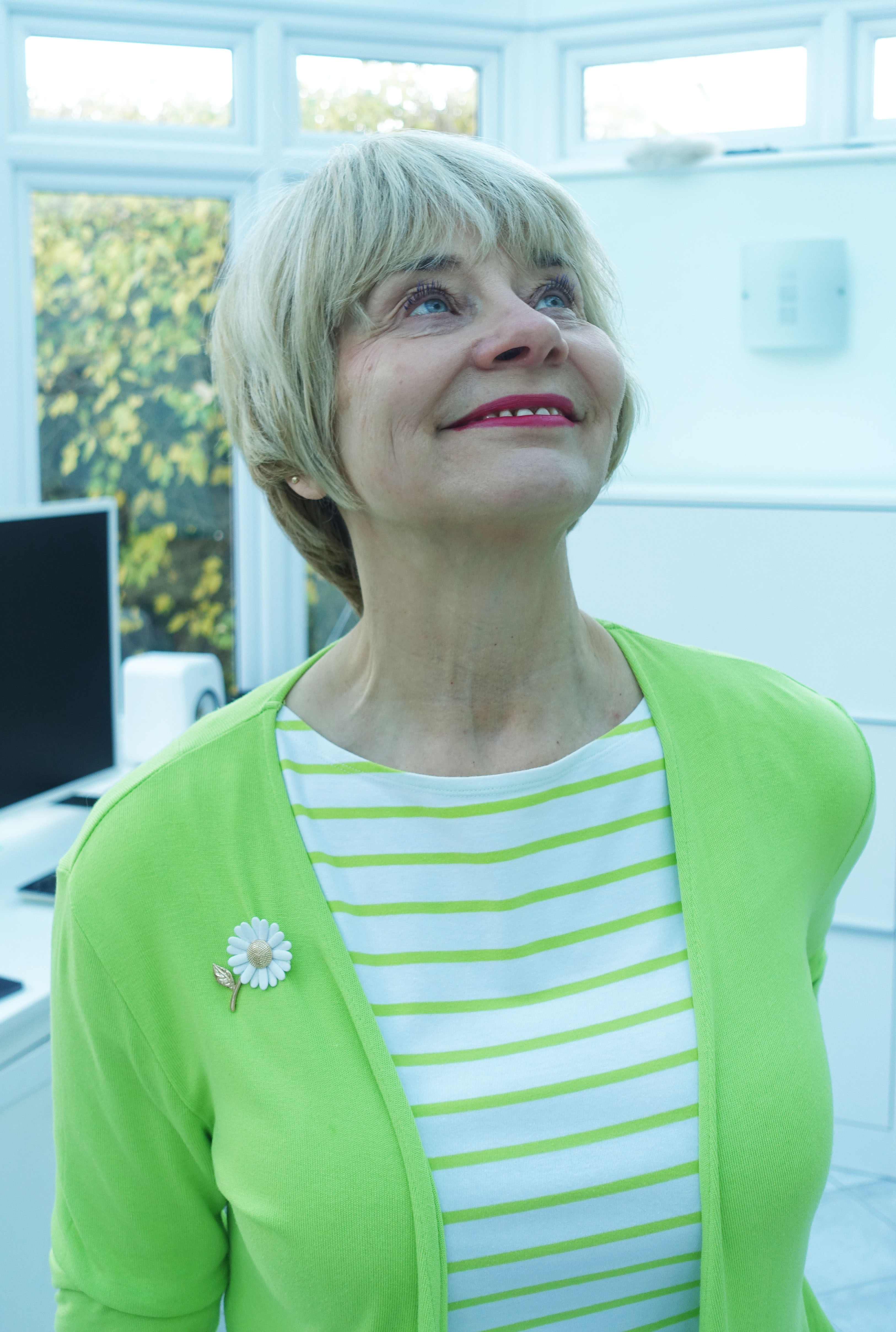 Is This Mutton contemplates a quieter Christmas this year in view of soaring costs and the need to be more sustainable. Editor in chief Gail Hanlon in lime and white striped top and lime short tie wrap