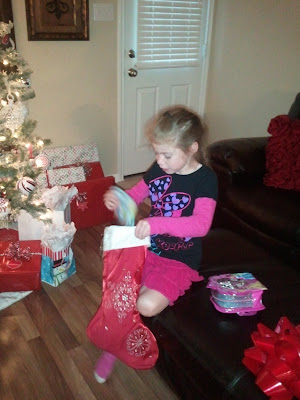 Opening her stocking