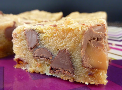 A chocolate chip and Rolo blondie, photographed on a burgundy Missoni plate