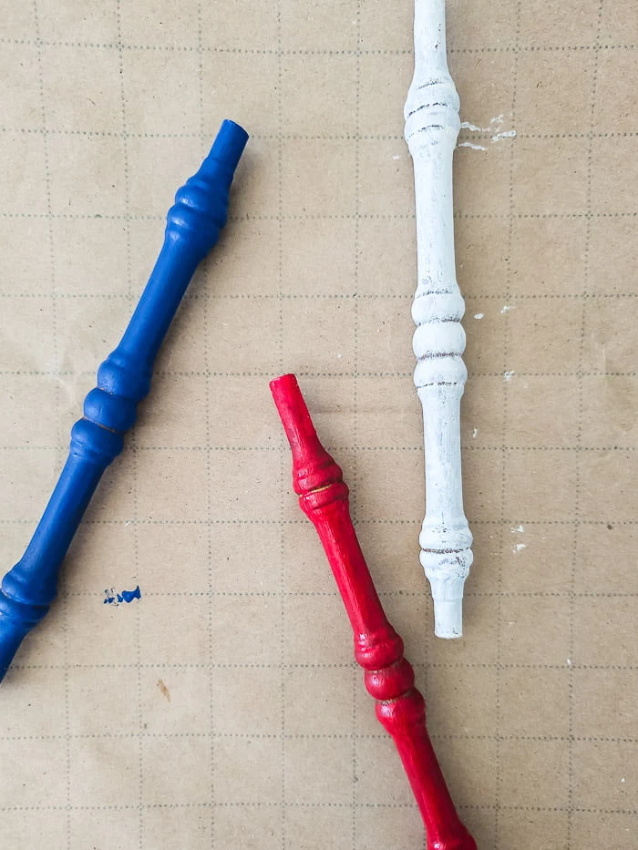 painted spindles in red, white and blue