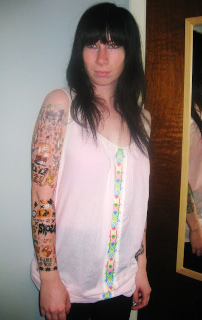 a sleeve of fake tattoos