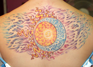abstract sun and moon tattoo