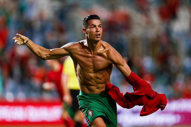 Cristiano Ronaldo celebrates after becoming the highest goal scorer in men's international football