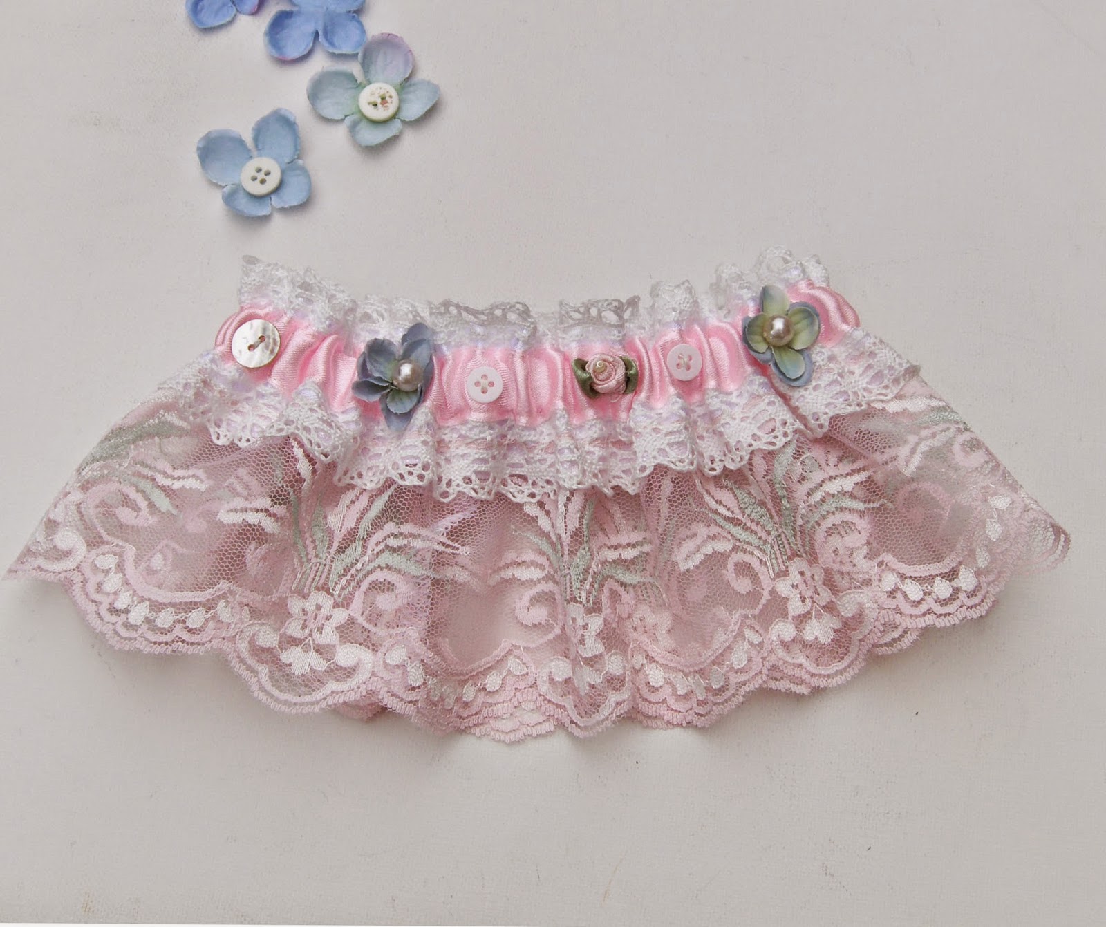 https://www.etsy.com/uk/listing/204103459/shabby-chic-wedding-bridal-garter-pink?ref=related-2