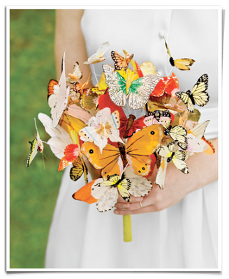 Instead of a traditional flower bouquet have an arrangement of butterflies