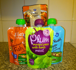 a selection of baby food packets: Plum Baby, Ella's Kitchen, Boots Baby Organic