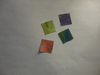 4 squares of card with textured colour