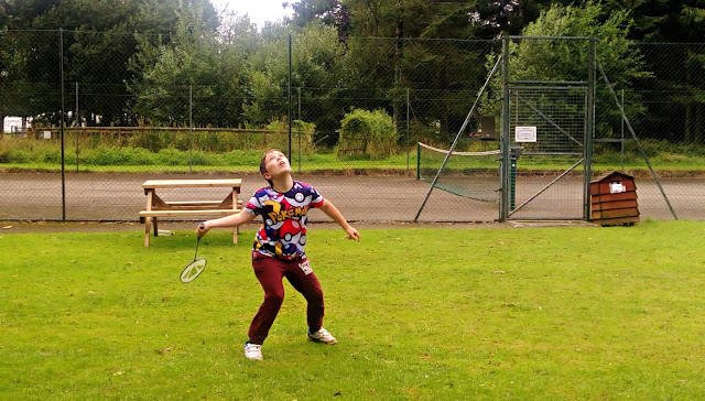 Boy playing badminton at Forest Glade
