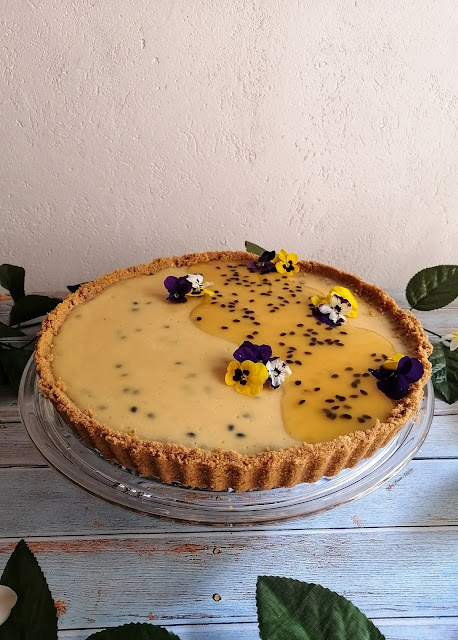 Passionfruit Tart, passionfruit, tart, summer, dessert, tart recipe, passionfruit recipe, passionfruit tart recipe, food, food blogger, food pictures, food photography, dessert recipe, dessert pictures, tart pictures, passionfruit pictures, edible flowers, food flatlay, dessert flatlay, food blogger, spicy fusion kitchen, sweet, pinterest desserts, flowers, step by step pictures, step by step recipe, woolworths, kenwood, nestle, digestive biscuits, granadilla, botswana, food blog, granadilla pictures, granadilla recipe, granadilla pulp