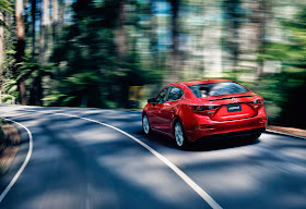Rear 3/4 view of 2015 Mazda 3