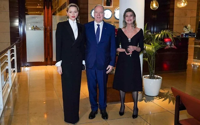 Princess Charlene wore an olive green Kelin tattersall double-breasted coat by Emilia Wickstead. Princess Caroline