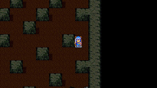 The party tiptoes around unseen pitfalls in the Cave to Rendarak, a dungeon in Dragon Quest II.