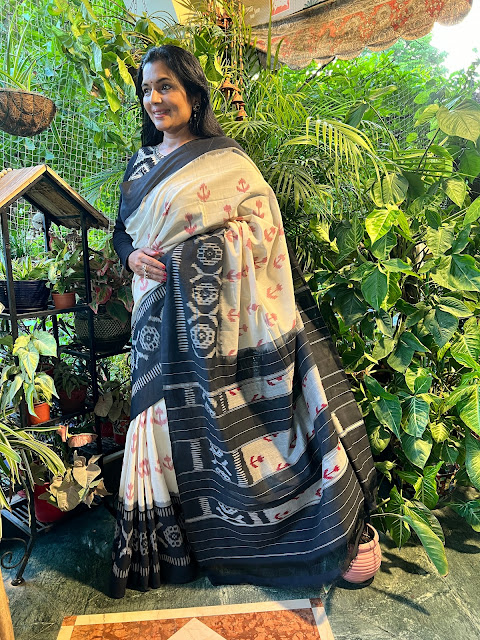 White, black and red Pochampaly ikat cotton saree.