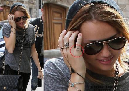miley cyrus tattoo ear. Miley Cyrus Gets Her Fifth