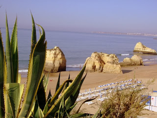 Beach scene with rocky outcrops