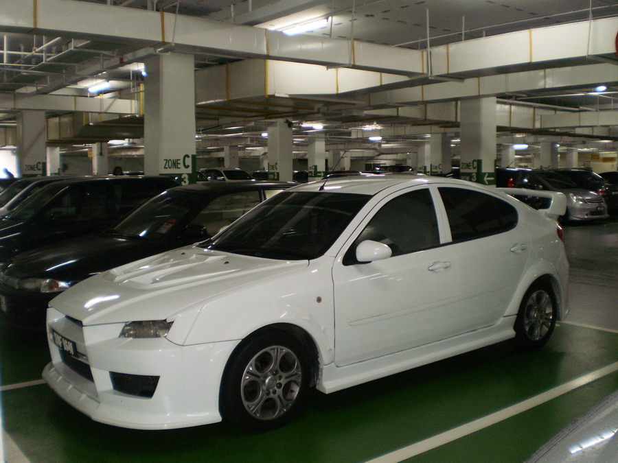 Inside the pictures is a modified Proton Gen 2 with Evo X body kit