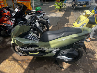 PCX sơn áo màu xanh nhạt tại sơn xe Sài Gòn.