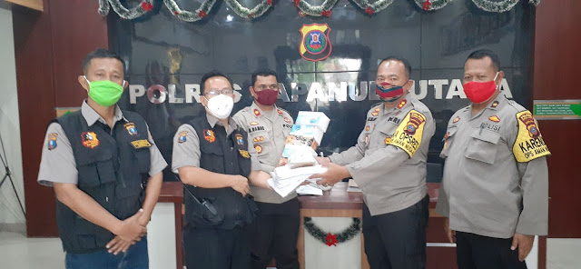 Bankom Garuda Peduli Covid-19, Menyerahkan APD dan Masker ke Polres  Taput