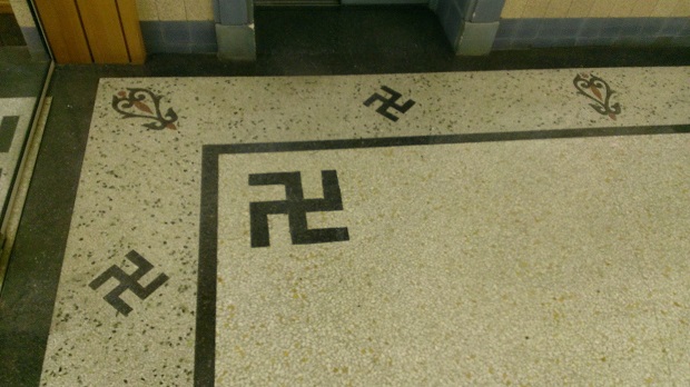 Floor with multiple left-facing and rotated black swastikas in the Dymocks Building, Sydney, Australia.