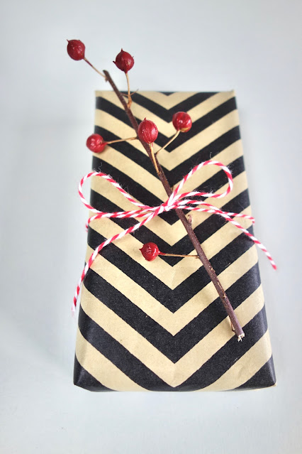 gift wrapping, holiday gift wrapping, gift wrapping idea, twine, winterberries, dried twigs, acrylic paint, paintbrush, crafts, handmade, blah to TADA, photo by Claire Mercado-Obias, holiday decor, decorating with winterberries