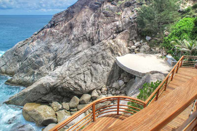 Wooden stairs down the cliff 
