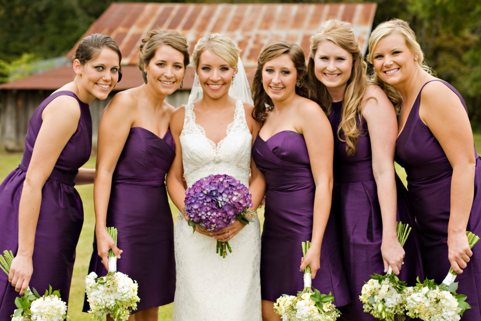 elegant bouquet of rich purple hydrangea for her outdoor wedding at