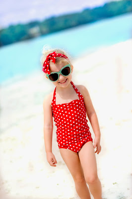 Kids 50's style, retro coca-cola photo shoot. Retro swimsuit and headband. Beach picture ideas