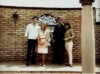 April 1966: Elvis, Priscilla, Jerry Schilling and his girlfriend Sandy Kawelo posing in the Meditation Garden at Graceland