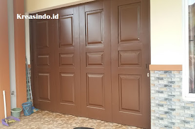Jasa Pintu  Garasi  Besi Merk Hisen  di Jakarta Bogor Depok 