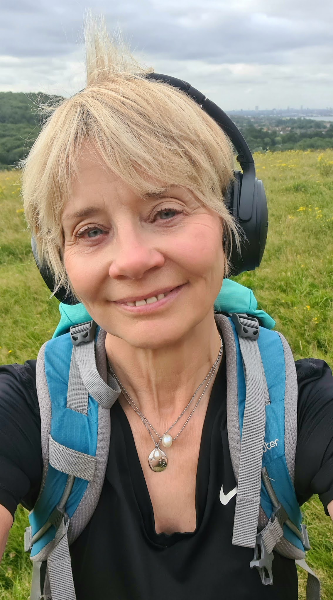 Wearing headphones on a country walk, Is This Mutton's Gail Hanlon with her monthly digest of podcast, TV and book recommendations