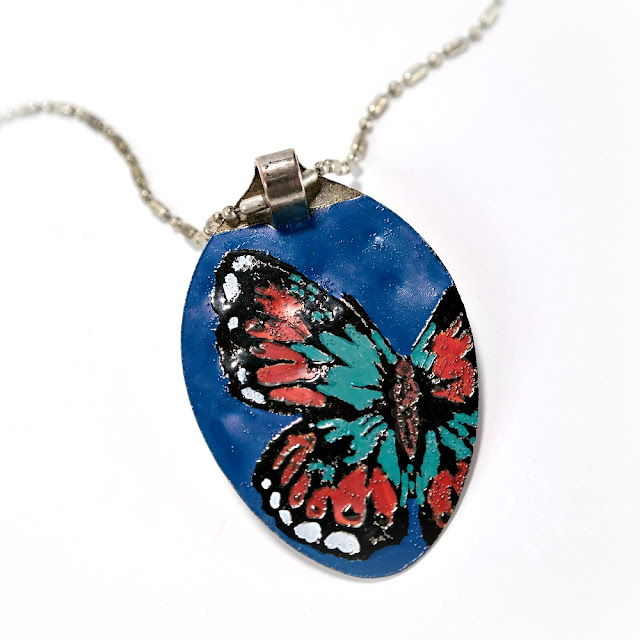 Metal Pendant with Embossed and Hand-Painted Butterfly